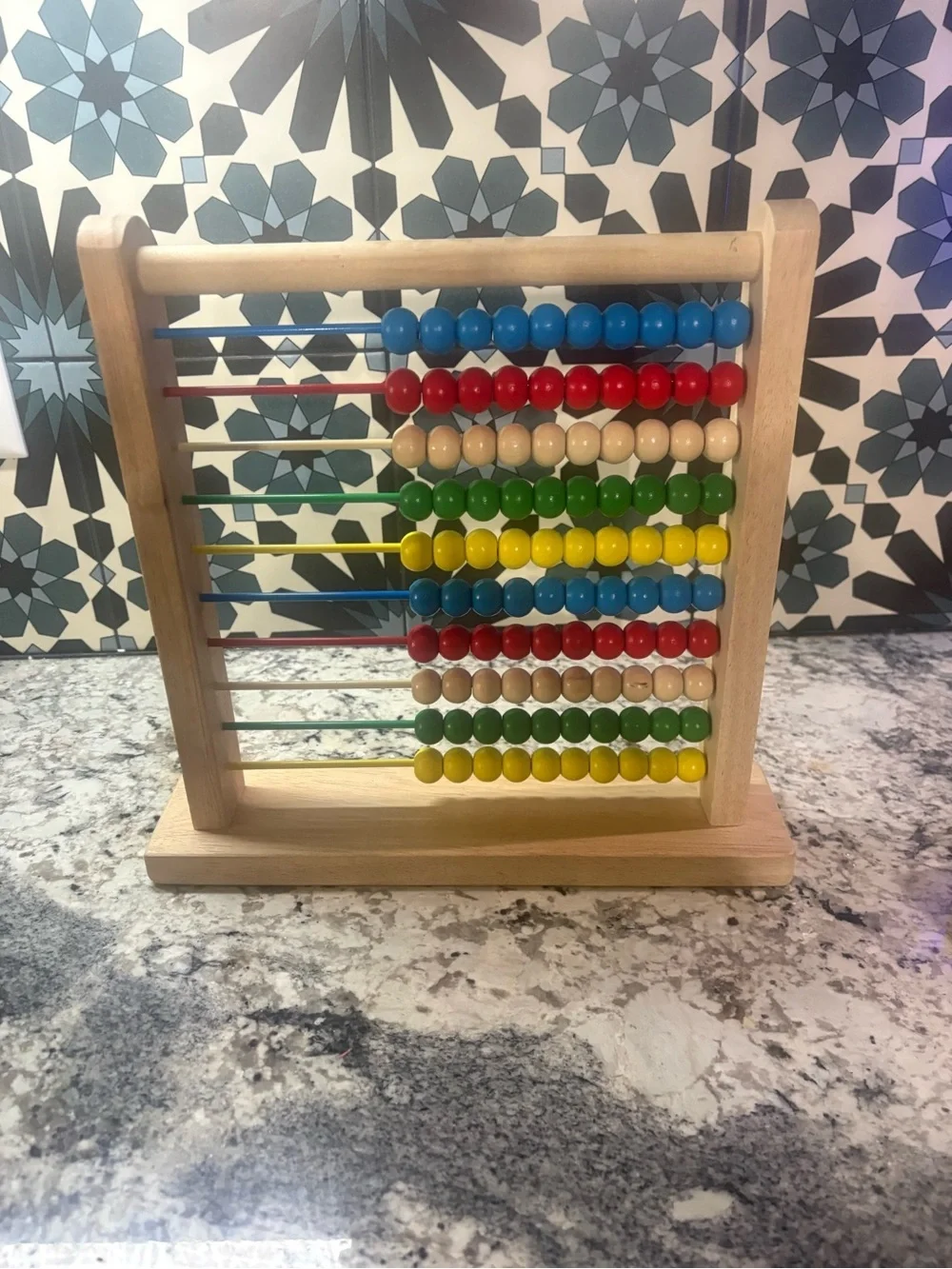Melissa & Doug Wooden Counting Abacus in Red, Blue, Green, Yellow, Natural